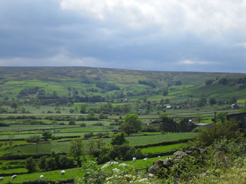 The view on the approach, you can just make out the road in the centre of the picture, it goes between the two clumps of trees, right, then left, then straight up!