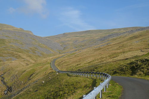 About halfway, looks like a downhill dip, in reality it’s probably flat, up ahead lies the hardest section