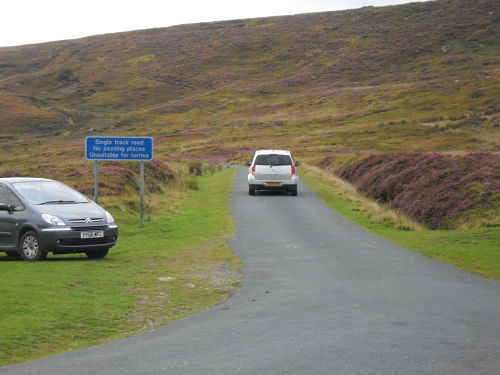 The bottom of the climb, the road then cuts left across the hill.