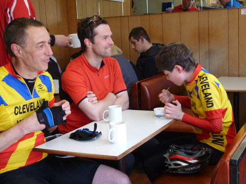 Youngest finisher Toby Tanfield tucks into a tub of well deserved ice cream, he doesn’t even look as though he’s done a ride! With Paul Thornton and Ryan Murray