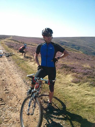 While I’m trying to affect a pose for the camera Roger Oldroyd is doing something quite different in the background. Answers on a postcard!